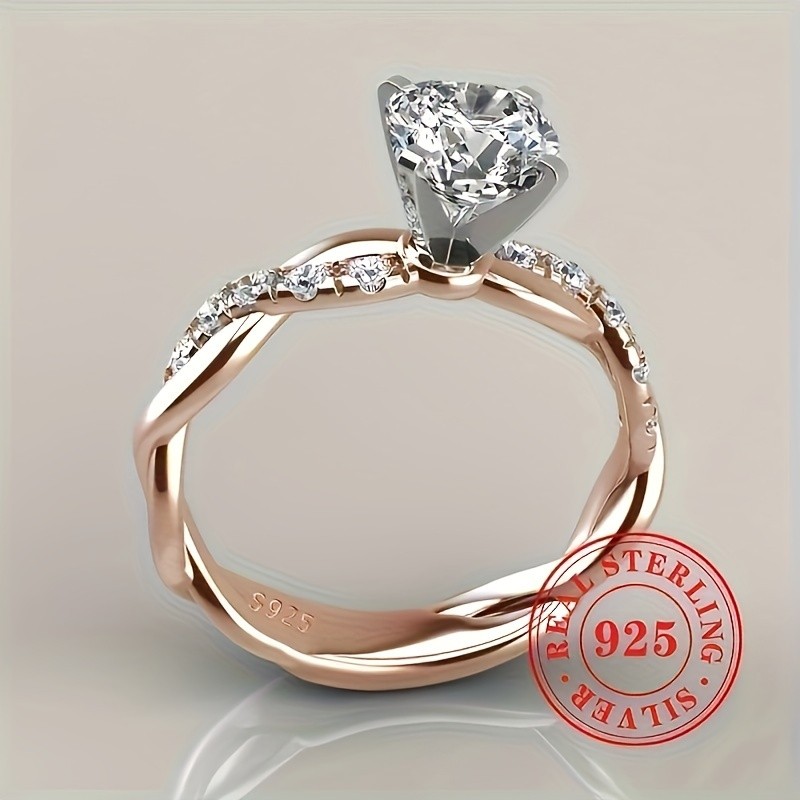 JOYHERS Elegant S925 Sterling Silver Engagement Ring with Twisted Design