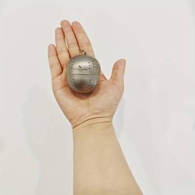 Portable Titanium Tea Infuser Ball with Chain  Perfect for Outdoor Tea Brewing and Loose Leaf Tea Enthusiasts