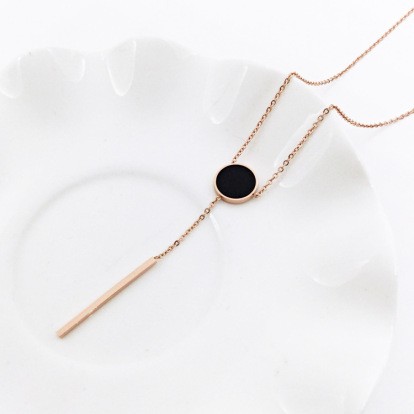 Black dot fringed long pendant necklace