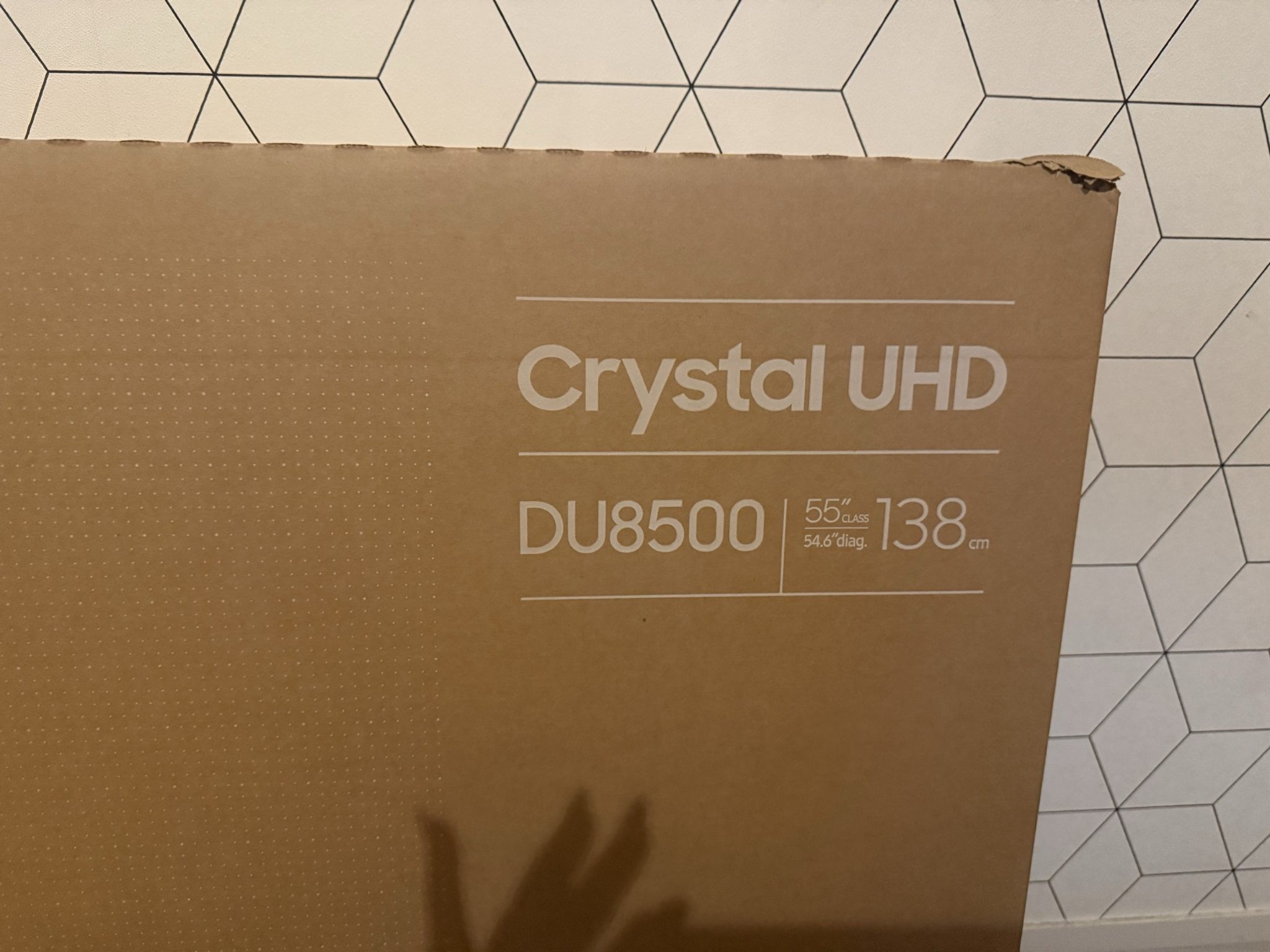 Boxed 55 samsung crystal UHD DU8500 and Soundbar C450
