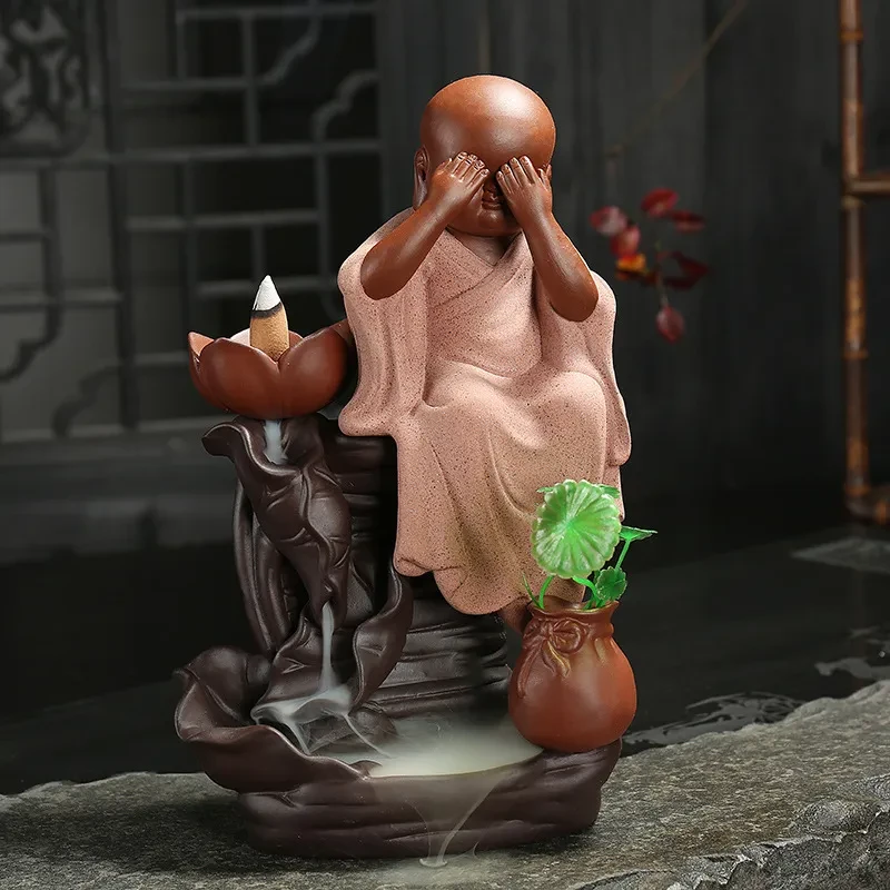 A Small Censer Made Of Purple Sand By The Monk