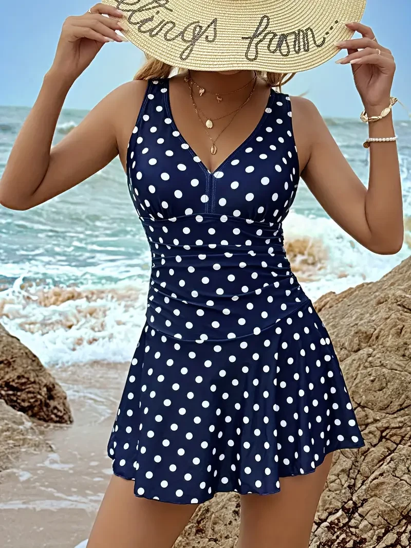 Polka Dot One-Piece Swimsuit - Flattering V Neckline, Stylish Criss Cross Straps, Flowy Skirted Design for a Feminine Touch