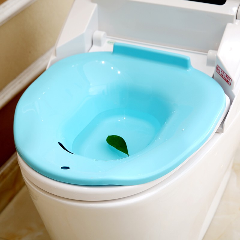 Pregnant women flushing bidet