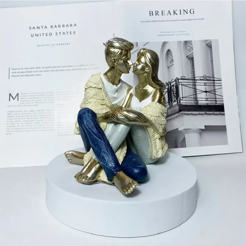 Couple Sitting And Staring At Resin Handicraft Decorative Ornaments