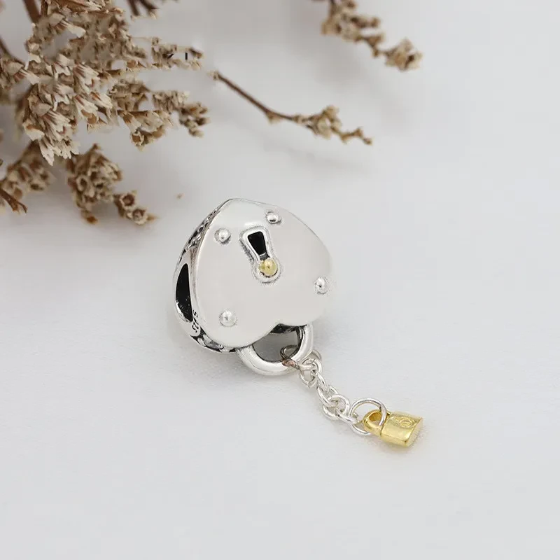 Gold love tassel pendant