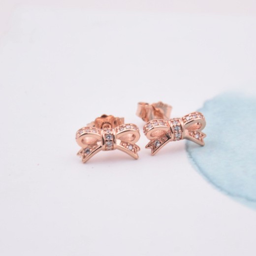 Rose gold bow stud earrings
