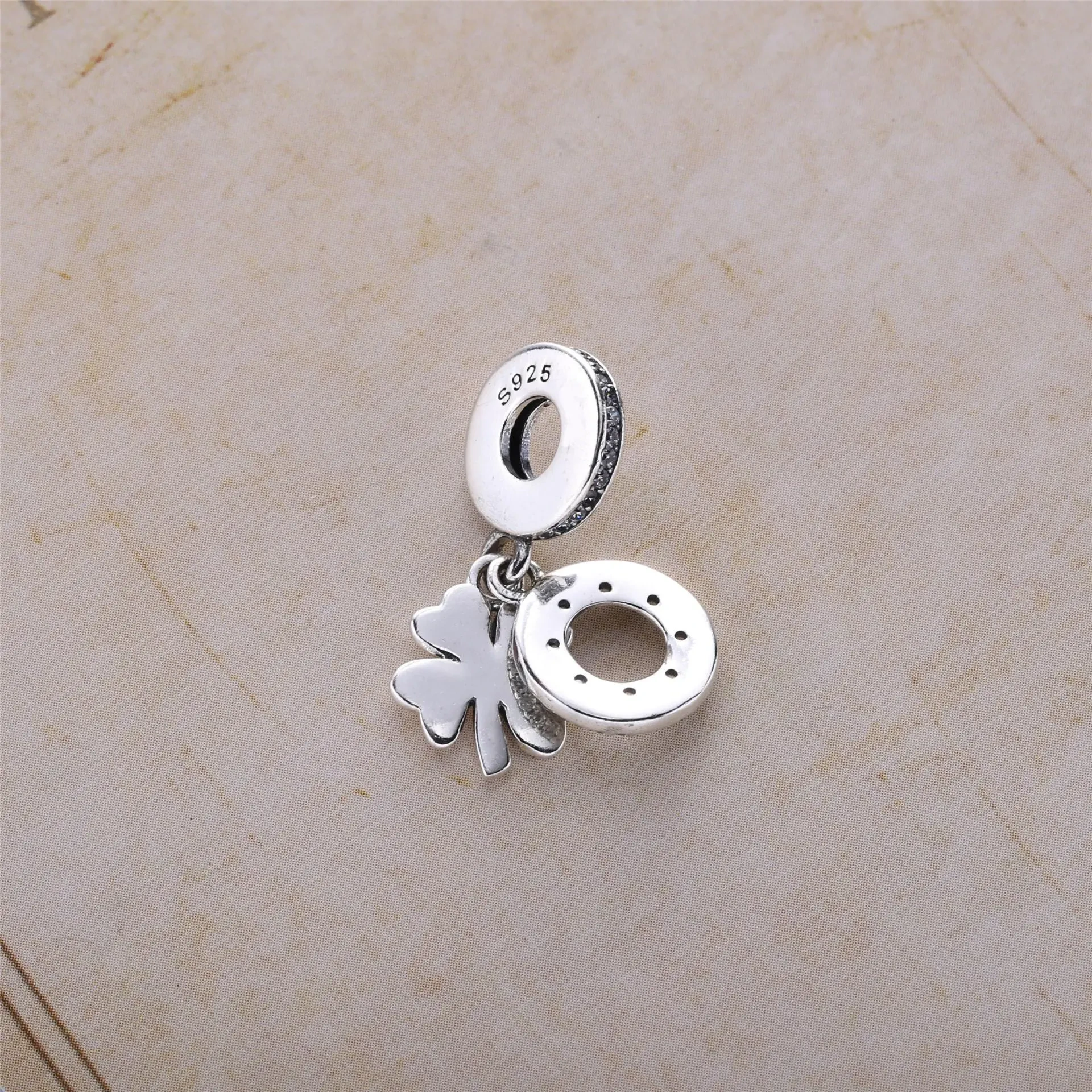 Four-leaf clover pendant charm