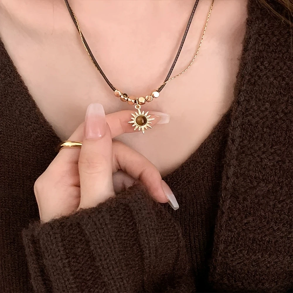 Boho-Chic Starburst Pendant Necklace | Vintage Alloy with Cat's Eye & Tiger's Eye Stones, Gold-Plated, Perfect for Daily Wear & Lunar New Year Gift