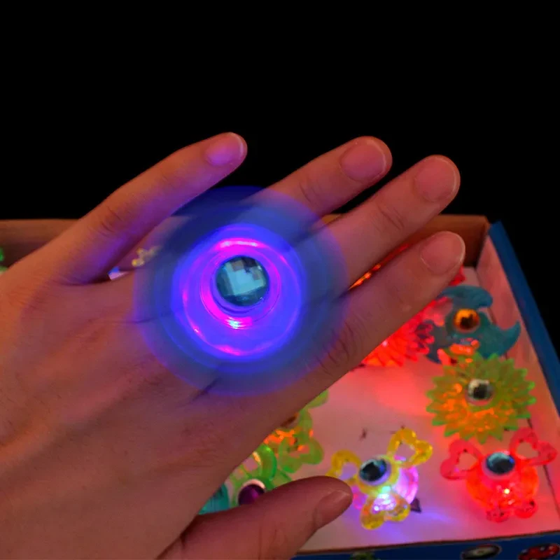 Children's luminous toy top finger light